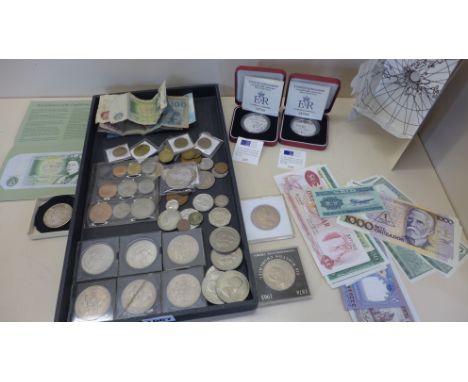 A collection of coins and bank notes to include two proof silver Crowns, 1922 silver Dollar etc 