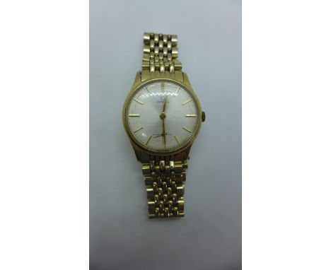 A gents 9ct gold Omega manual wristwatch on gold plate and steel bracelet, the watch with white dial and baton marks, Omega l