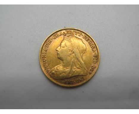 An 1898 gold half sovereign weight approx 4 grams, clean condition light wear 