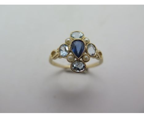 A 9ct hallmarked yellow gold sapphire, aquamarine and pearl ring, ring size R, approx 2 grams, in good condition 