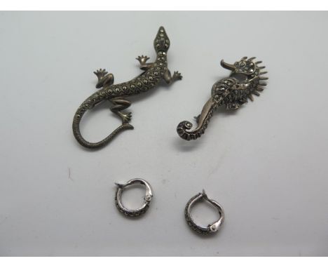 A silver and marcasite lizard brooch, length 5cm and a pair of silver marcasite earrings 