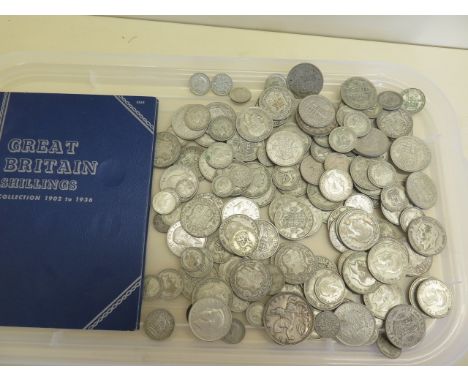 A large volume of post 1919 pre 1947 silver British coinage, including Crowns, half crowns etc, total weight approx  43 troy 