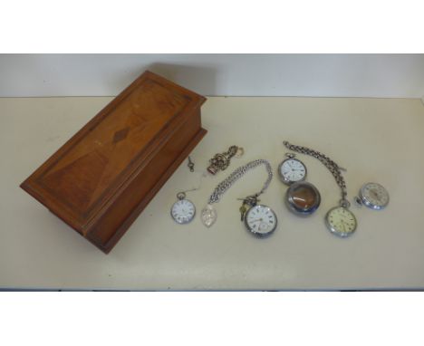 Three silver pocket watches and two others, with three watch chains 