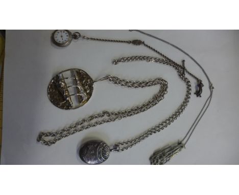 A silver locket on chain, a Denmark white metal pendant on chain, another pendant on chain and a silver pocket watch on chain