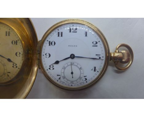 A 9ct gold Rolex, full hunter pocket watch, the face with Arabic numerals and subsidiary seconds dial at 6 o'clock and marked