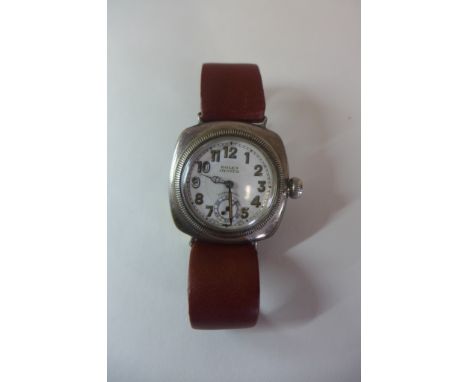 A hallmarked 1930 gentleman's Rolex Oyster Ultra Prima silver cushion case wristwatch with white dial and Arabic numerals, en