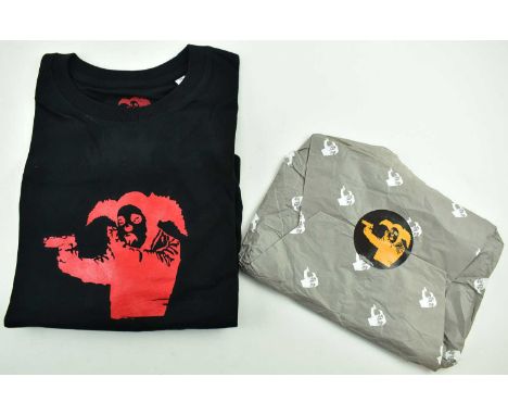 Banksy (British, b 1973)"Clown with guns" 1999 1st editionPrint on T-shirtLimited edition of 200Comes with clowns with gun or