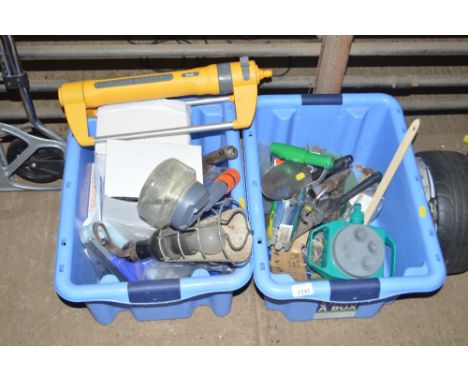 Two boxes containing various tools and household items