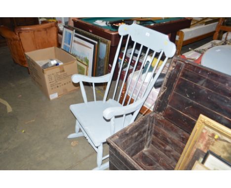 A grey painted stick back rocking chair 