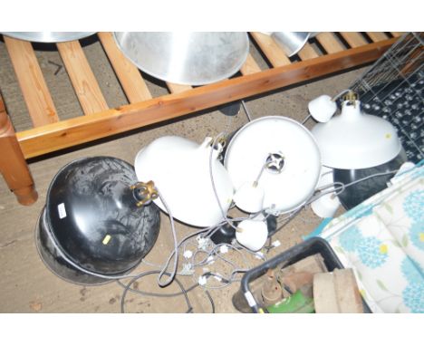 A quantity of metal light shades