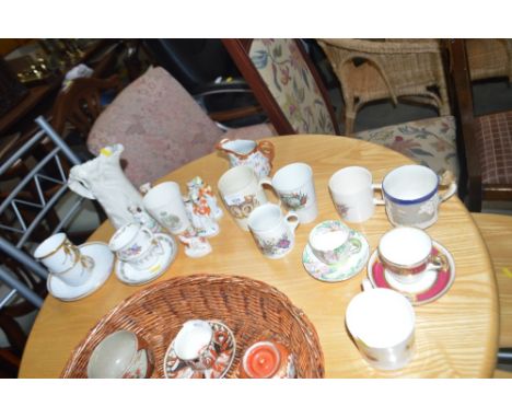 A quantity of china mugs to include commemorative examples; a Royal Worcester jug; teaware etc.