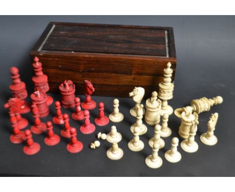 A 19th century English bone barley corn pattern chess set, red stained opposition, the kings 9.5cm high