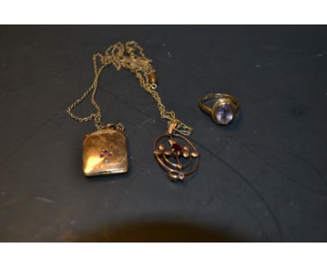 A 9ct gold ring with amethyst stone , an art nouveau pendant set with garnet; a rolled gold locket