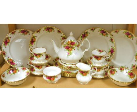 A Royal Albert Old Country Roses tea service for four, comprising dinner plates, tea plates, side plates, teacups, saucers, b