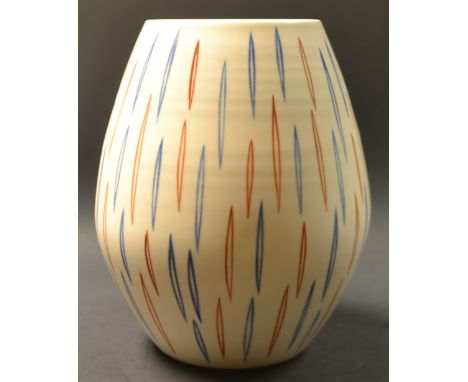 A Poole ovoid vase, hand painted with elongated ellipses in blue and brown on a cream ground, 21cm high, printed marks in bla