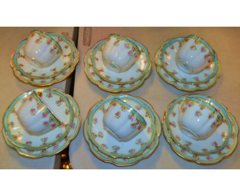 A Noritake tea service for six, decorated with pink roses, blue collar and gilt highlights, printed marks