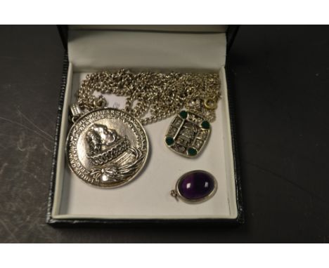 A silver souvenir Spanish Armada pendant and chain; a Mayan type pendant; etc (3)