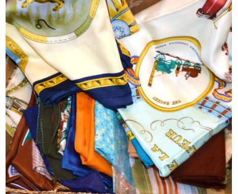 A 1970s Hermes silk scarf, Les Merveilles De La Vapeur, depicting the history of the steam train; another silk scarf Signs of