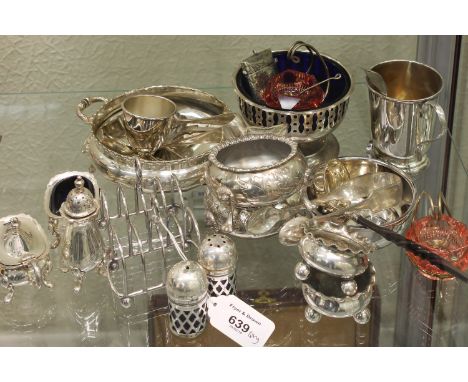 A small quantity of silver plated items, including a pair of pink glass salts, a christening cup, flatware, etc.