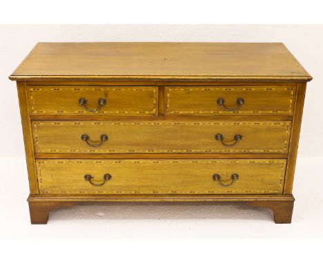 An Edwardian low walnut chest of two short over two long drawers, inlaid detail, raised on bracket feet, 106 x 45 x 63cm appr