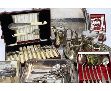 A quantity of silver plated items, including trays, flatware, and a cased set of fish eaters