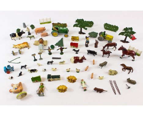 A quantity of lead farm toys, including a tractor, figures and animals