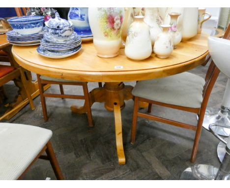 A large circular modern pine single pillar dining table, 4' diameter 