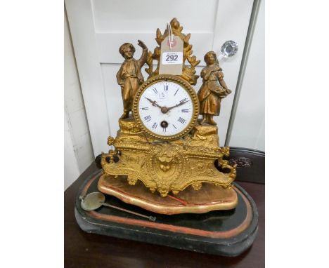 A French gilt figure mounted mantel clock 