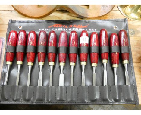 A 12 piece wood carving chisel set 