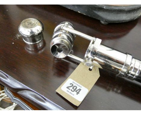 A walking stick with a plated telescope handle 