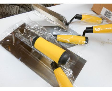A new 5 piece plasterer and bricklayers trowel set 