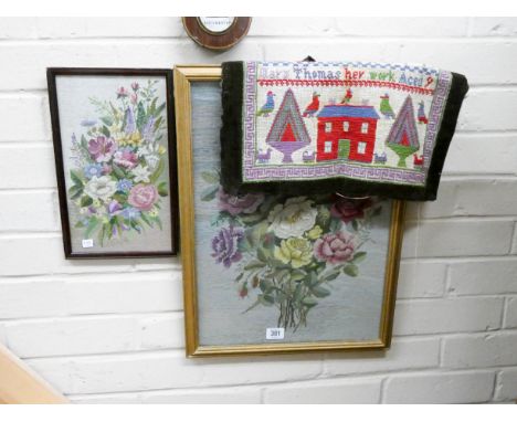 Two framed tapestry pictures of flowers and a loose sampler 