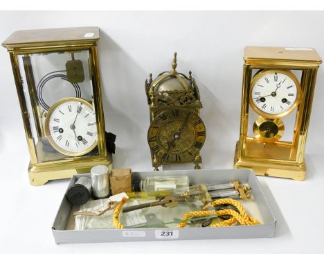 Two mantel clock in brass and glazed cases, brass lantern clock and spares etc - all as found