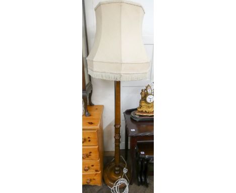 A mahogany reeded column standard lamp with cream shade 