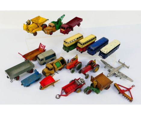 Dinky - A group of vehicles including Field Marshall tractor # 301, Leyland Royal Tiger bus # 282, Commer break down truck # 