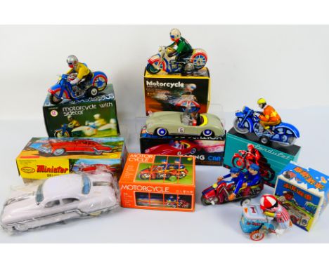 QSH - Vintage Tinplate - A group of boxed tinplate vehicles including 2 x motorcycles, 2 x motorcycles with sidecars, a racin