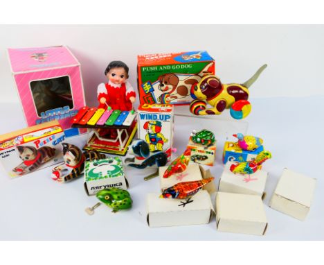 Vintage Tinplate - 12 x boxed tinplate models including a Jumping Frog, a Little Performer, a Swimming Duck, a Push And Go Do