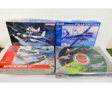 Dragon - Revell -Four boxed military aircraft plastic model kits. Lot includes Dragon 'Master Series' Mistel-2/S2 (Fw190F-8w 