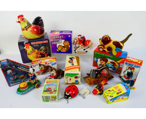 Kovap - Vintage Tinplate - A collection of boxed animal toys including a battery powered Hen Laying Eggs, a woodpecker, a Jum