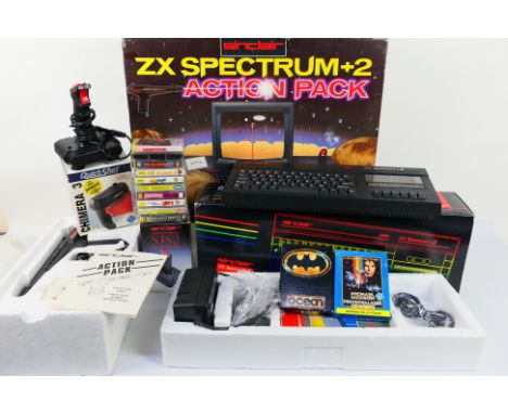 Sinclair - ZX Spectrum. A boxed Sinclair ZX Spectrum +2 with Sinclair Light Gun, Sinclair Joystick, Instruction Manual, PSU, 