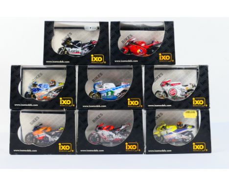 IXO - eight 1:24 scale diecast model motorbikes, all appear mint in rigid plastic cases with outer sleeves (one or two sleeve