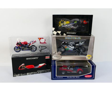 Minichamps and other - four scale models comprising two 1:12 Minichamps motorbikes,one 1:9 scale Protar Ducatti and a 1:18 sc