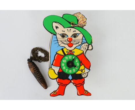 Puss in Boots - Clock. A wooden, painted Puss in Boots clock, Made in Germany. Item appears in Excellent condition with Pinec