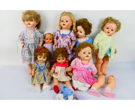 Pedigree - Others - A collection of eight unboxed vintage hard plastic dolls. Lots includes Pedigree 20" sleepy eyes open mou
