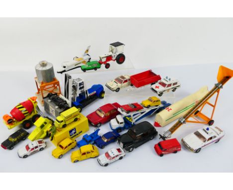 Corgi - A selection of Twenty-Three playworn diecast models in varying scales and ranging from Playworn to VG condition. Lot 