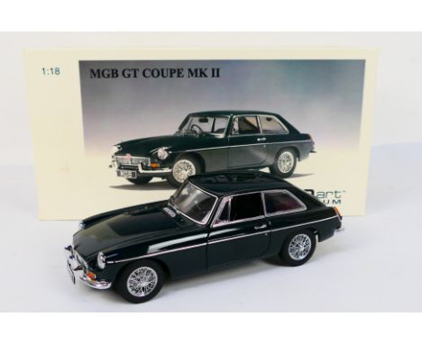 Autoart - A boxed 1:18 scale 1969 MGB GT Coupe MkII in British Racing Green # 76602. The model appears in Near Mint condition