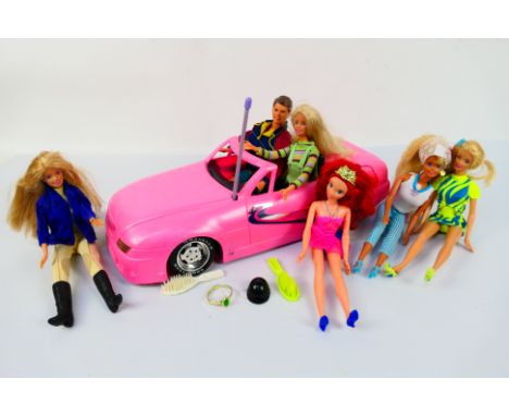 Mattel - Barbie - An unboxed collection of Barbie Dolls, an unboxed Ken plus unboxed Barbie Convertible Car (missing remote c