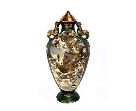 Japan, 20th centuryVase mounted at the foot of the ceramic lamp with polychrome decorated dit de Satsuma, the zoomorphic shap