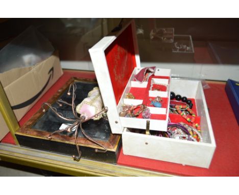 A box of costume jewellery; a jewellery stand and a small display cabinet