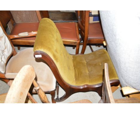 A Victorian style button down chair